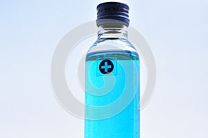 70%alcoholÃ¢â¬â¹ andÃ¢â¬â¹ gel-gelatinÃ¢â¬â¹mixedÃ¢â¬â¹ alcohol in a clear plastic bottle. photo